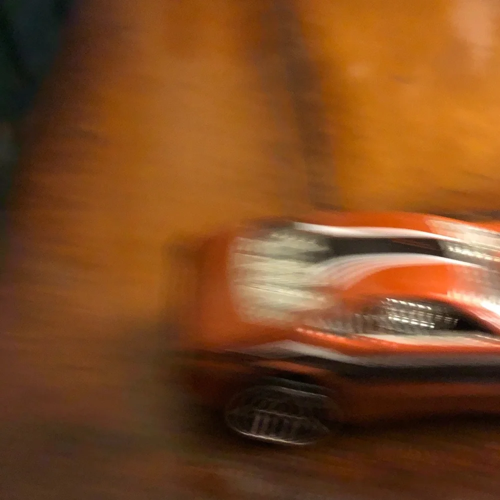 Orange Toy Muscle Car with Exposed Engine